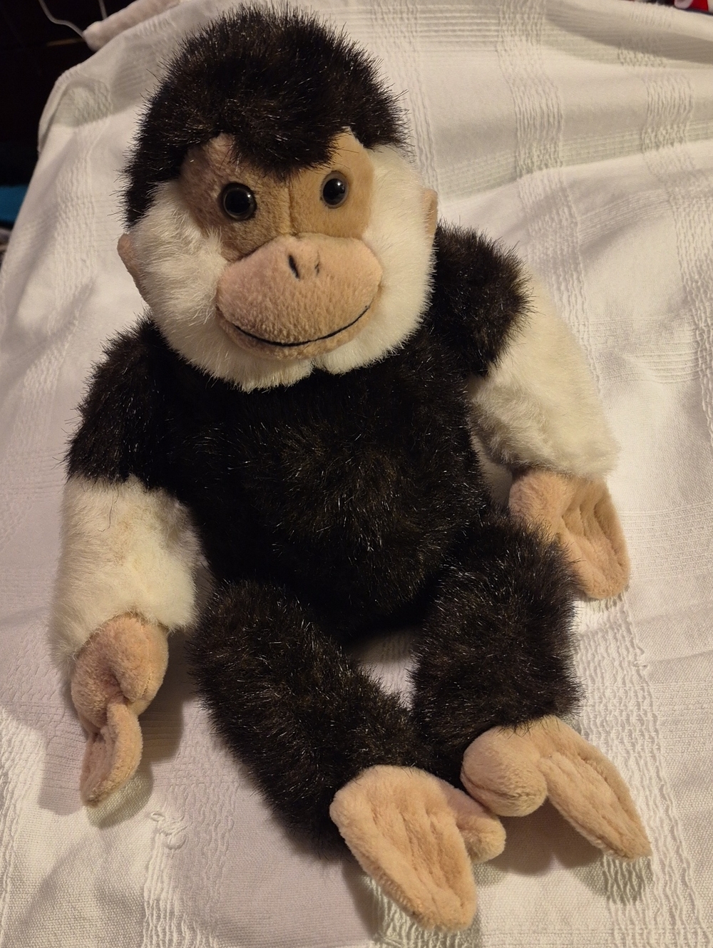 FAO Swartz Fifth Avenue 14" tall plush monkey plush sits independently EUC